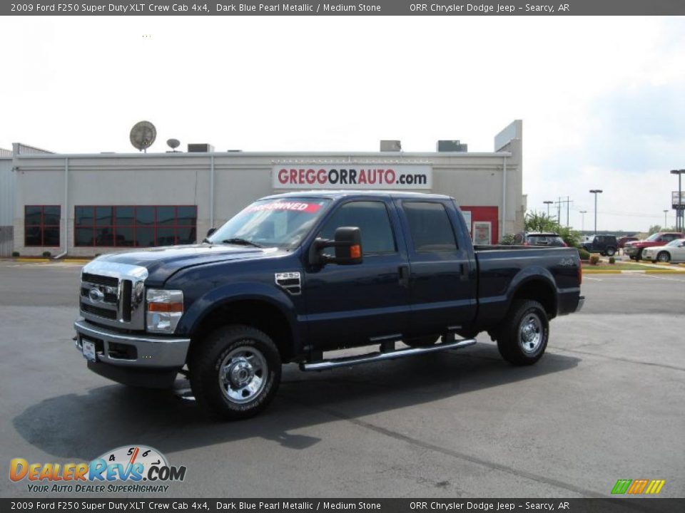 2009 Ford F250 Super Duty XLT Crew Cab 4x4 Dark Blue Pearl Metallic / Medium Stone Photo #1