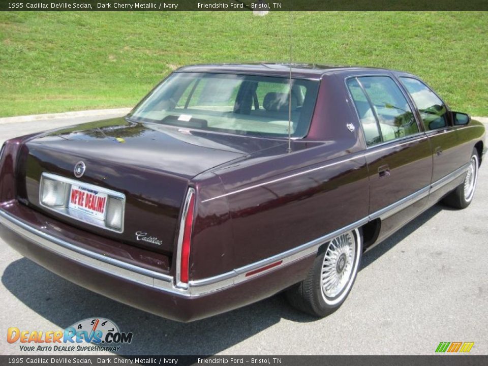 1995 Cadillac DeVille Sedan Dark Cherry Metallic / Ivory Photo #6