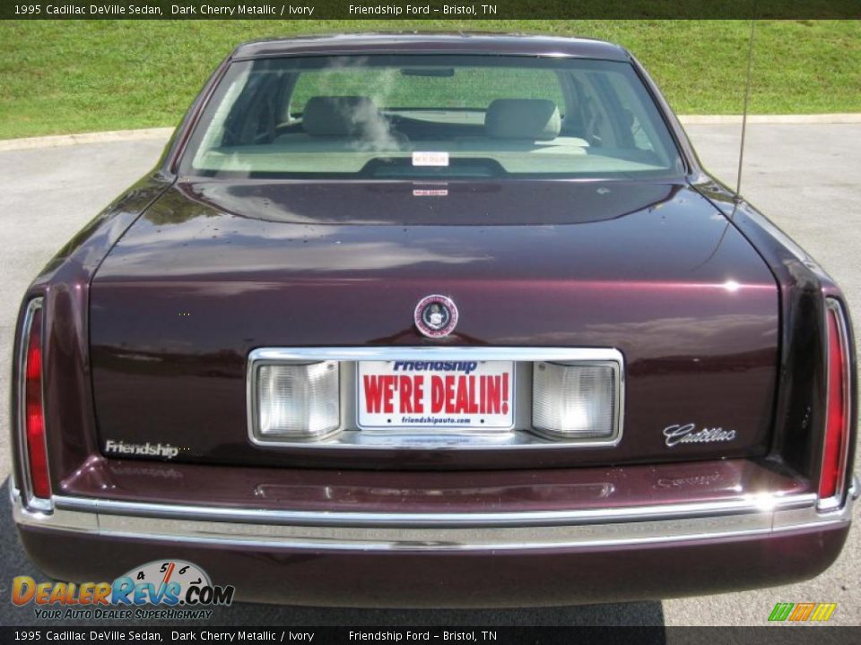 1995 Cadillac DeVille Sedan Dark Cherry Metallic / Ivory Photo #7