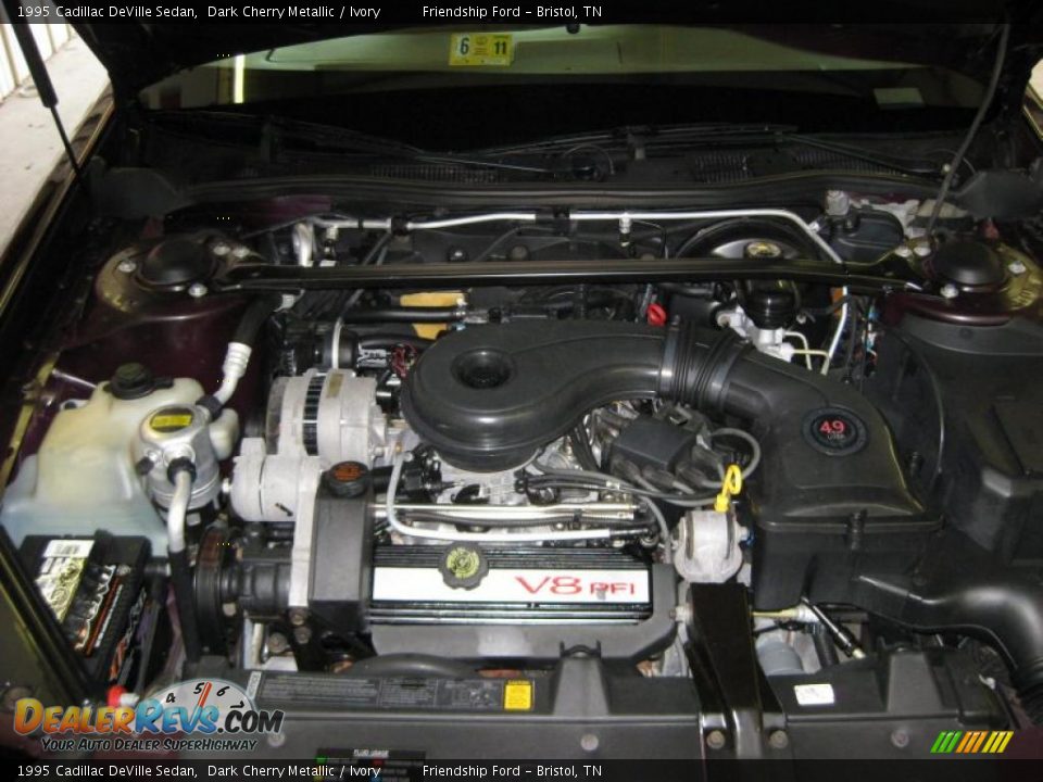 1995 Cadillac DeVille Sedan Dark Cherry Metallic / Ivory Photo #13