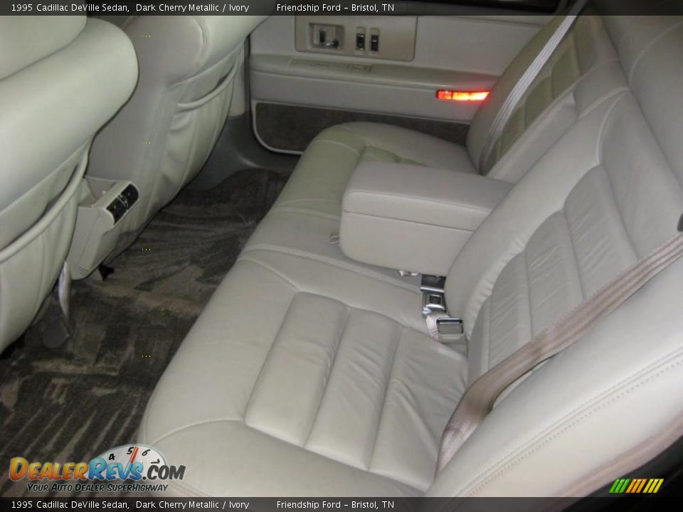 1995 Cadillac DeVille Sedan Dark Cherry Metallic / Ivory Photo #24