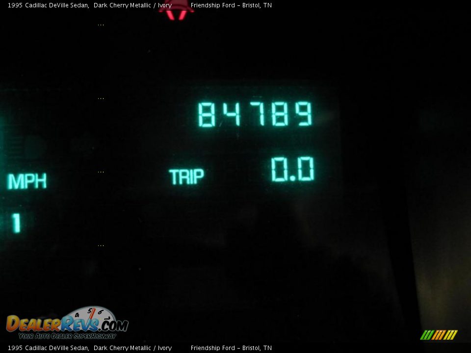 1995 Cadillac DeVille Sedan Dark Cherry Metallic / Ivory Photo #29