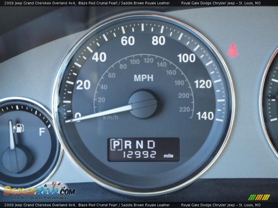 2009 Jeep Grand Cherokee Overland 4x4 Blaze Red Crystal Pearl / Saddle Brown Royale Leather Photo #14