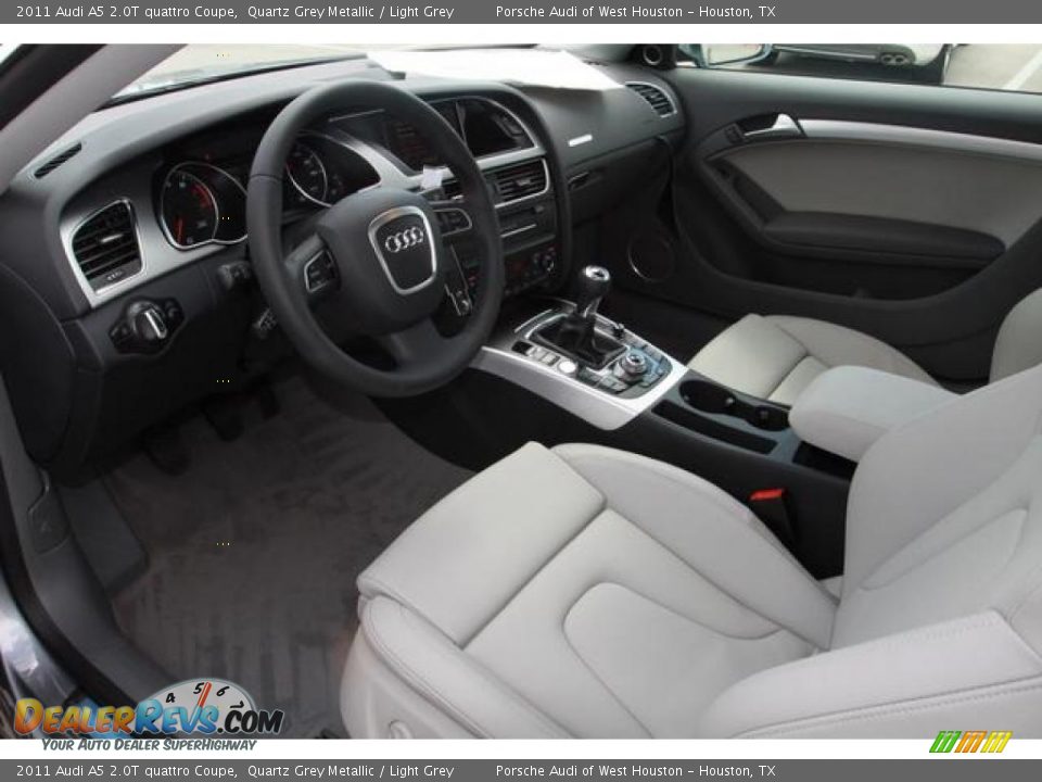 Dashboard of 2011 Audi A5 2.0T quattro Coupe Photo #6