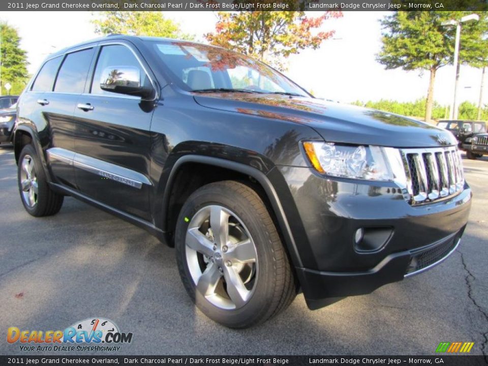 Front 3/4 View of 2011 Jeep Grand Cherokee Overland Photo #4