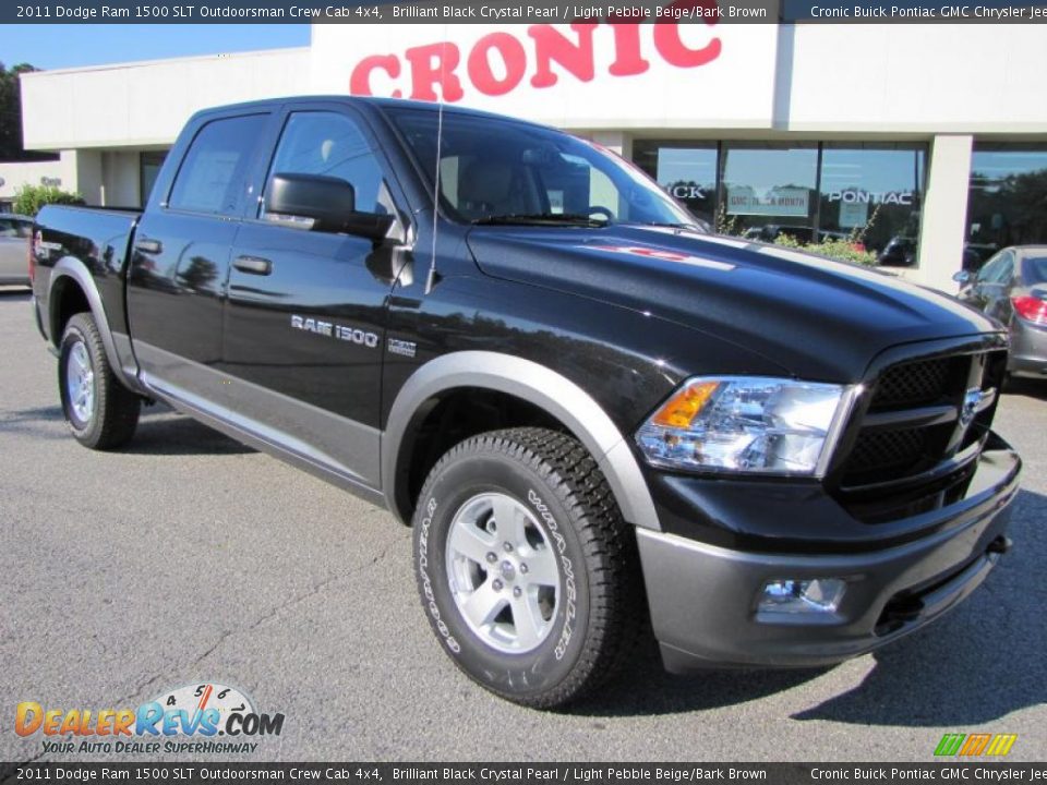 Front 3/4 View of 2011 Dodge Ram 1500 SLT Outdoorsman Crew Cab 4x4 Photo #1