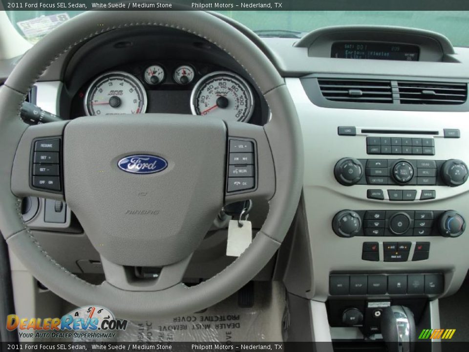 2011 Ford Focus SEL Sedan White Suede / Medium Stone Photo #25