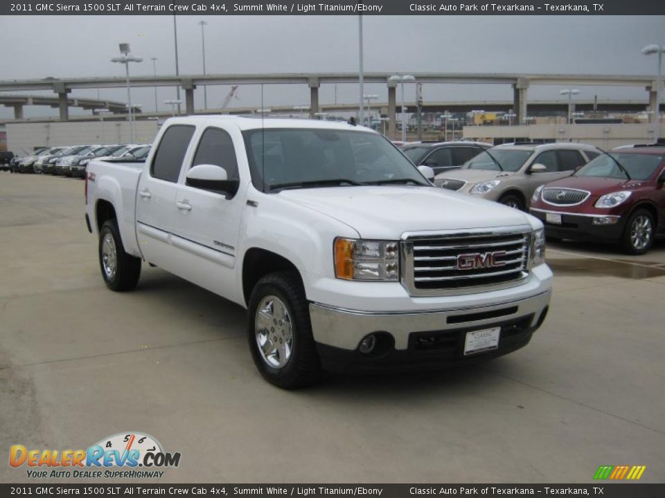 Front 3/4 View of 2011 GMC Sierra 1500 SLT All Terrain Crew Cab 4x4 Photo #7