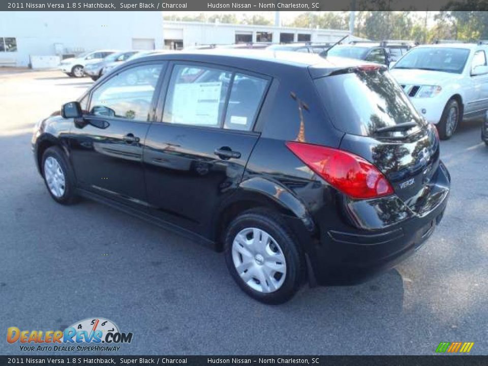 2011 Nissan versa hatchback black #1