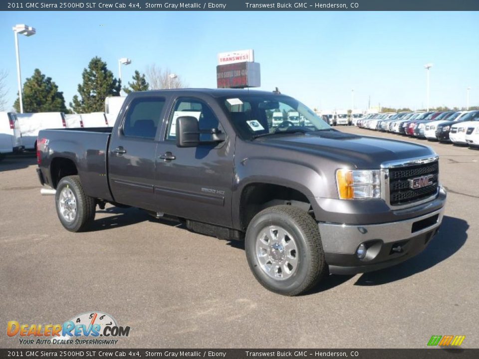 Front 3/4 View of 2011 GMC Sierra 2500HD SLT Crew Cab 4x4 Photo #1