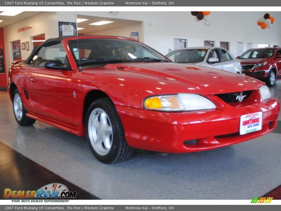 Front 3/4 View of 1997 Ford Mustang V6 Convertible Photo #9