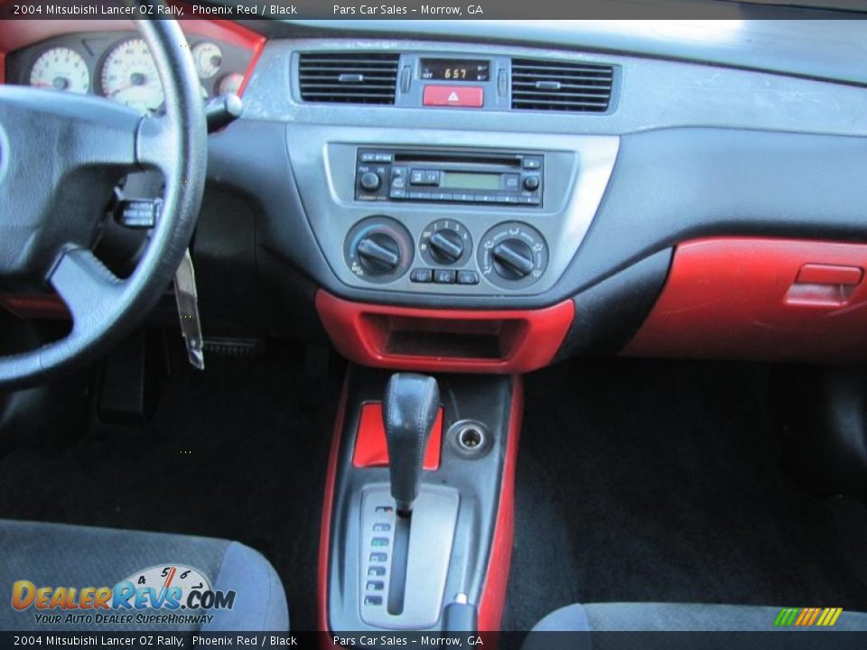 Dashboard of 2004 Mitsubishi Lancer OZ Rally Photo #10