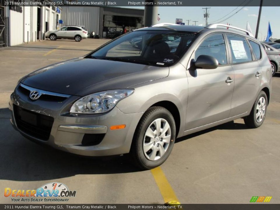 Front 3/4 View of 2011 Hyundai Elantra Touring GLS Photo #7