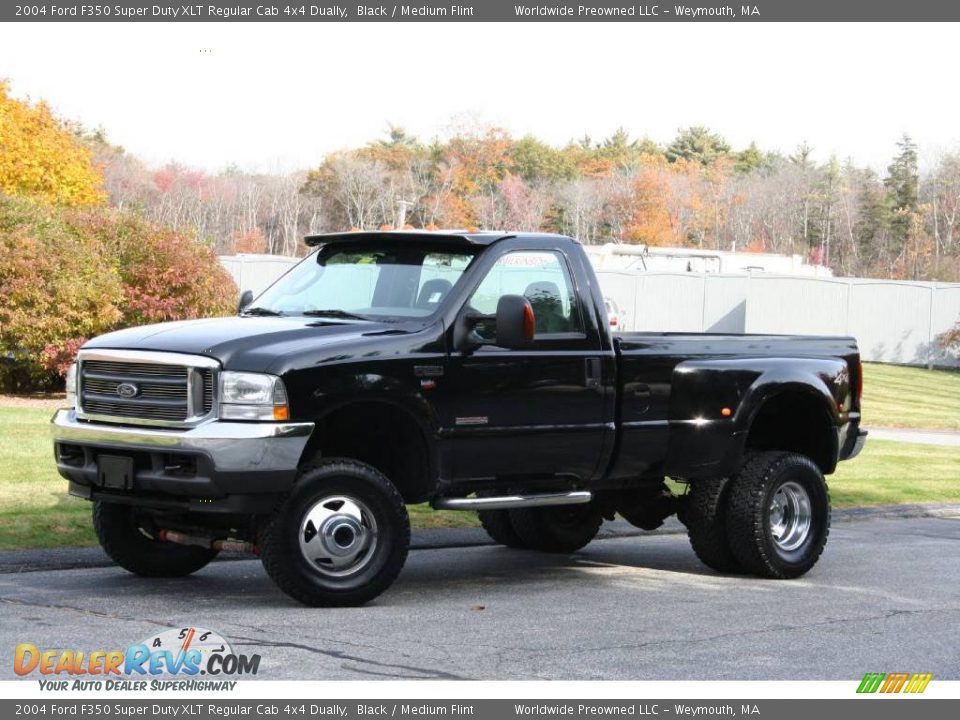 Front 3/4 View of 2004 Ford F350 Super Duty XLT Regular Cab 4x4 Dually Photo #2