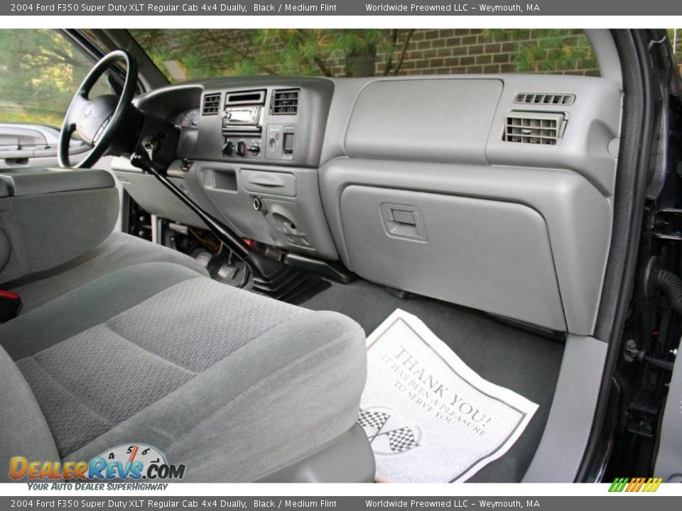 Dashboard of 2004 Ford F350 Super Duty XLT Regular Cab 4x4 Dually Photo #26