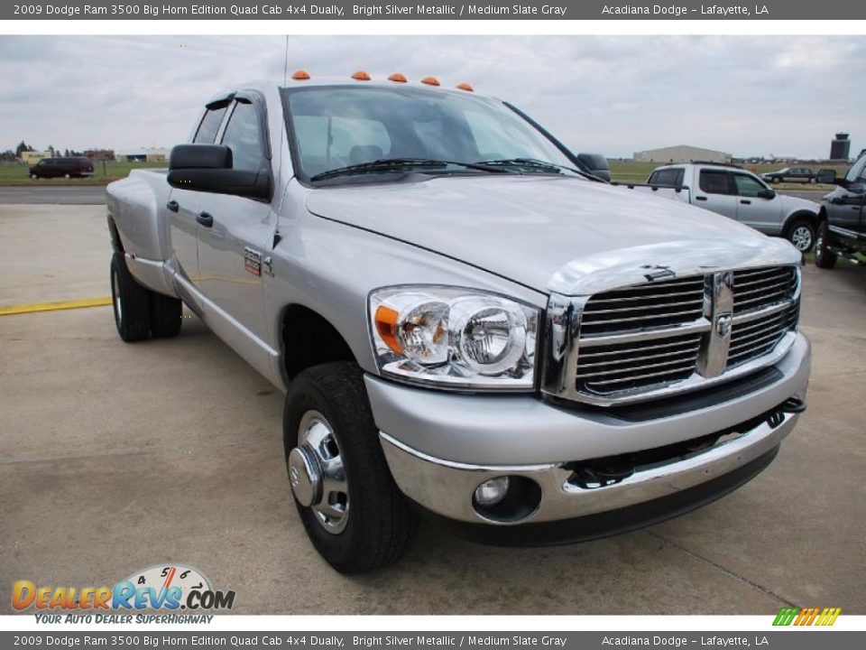 Front 3/4 View of 2009 Dodge Ram 3500 Big Horn Edition Quad Cab 4x4 Dually Photo #11