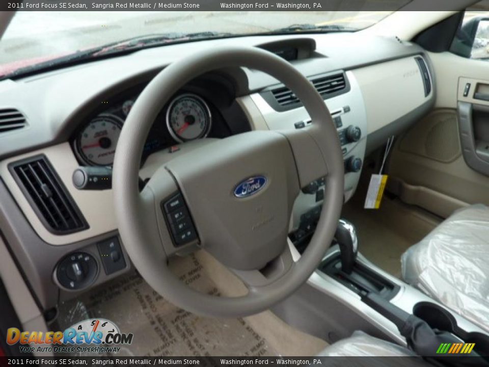 2011 Ford Focus SE Sedan Sangria Red Metallic / Medium Stone Photo #11
