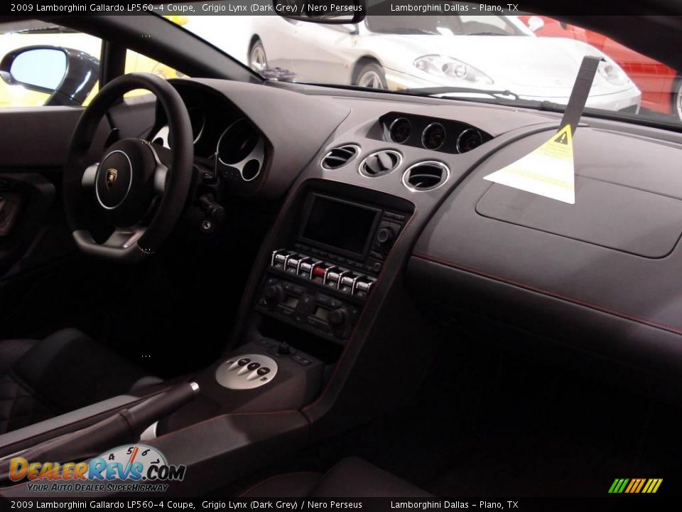 Dashboard of 2009 Lamborghini Gallardo LP560-4 Coupe Photo #11