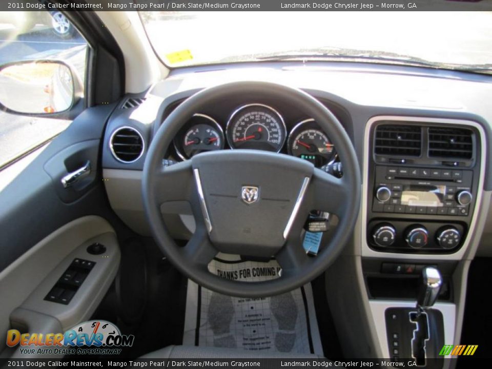 Dashboard of 2011 Dodge Caliber Mainstreet Photo #11