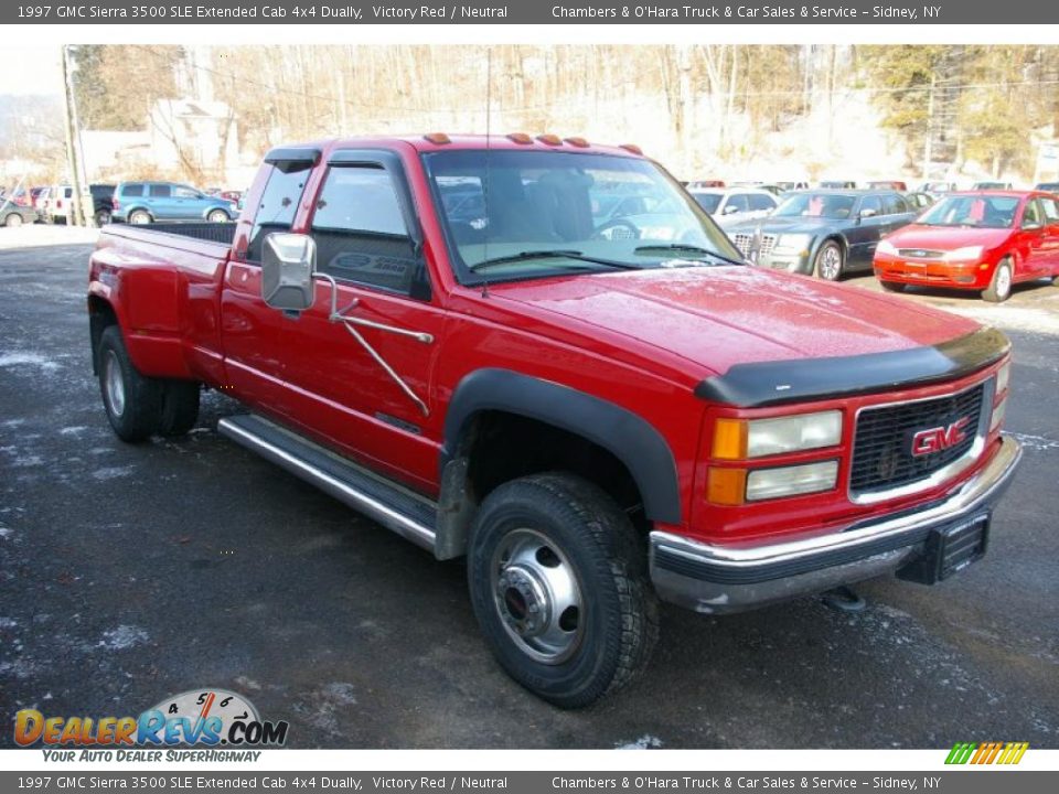 Front 3/4 View of 1997 GMC Sierra 3500 SLE Extended Cab 4x4 Dually Photo #12