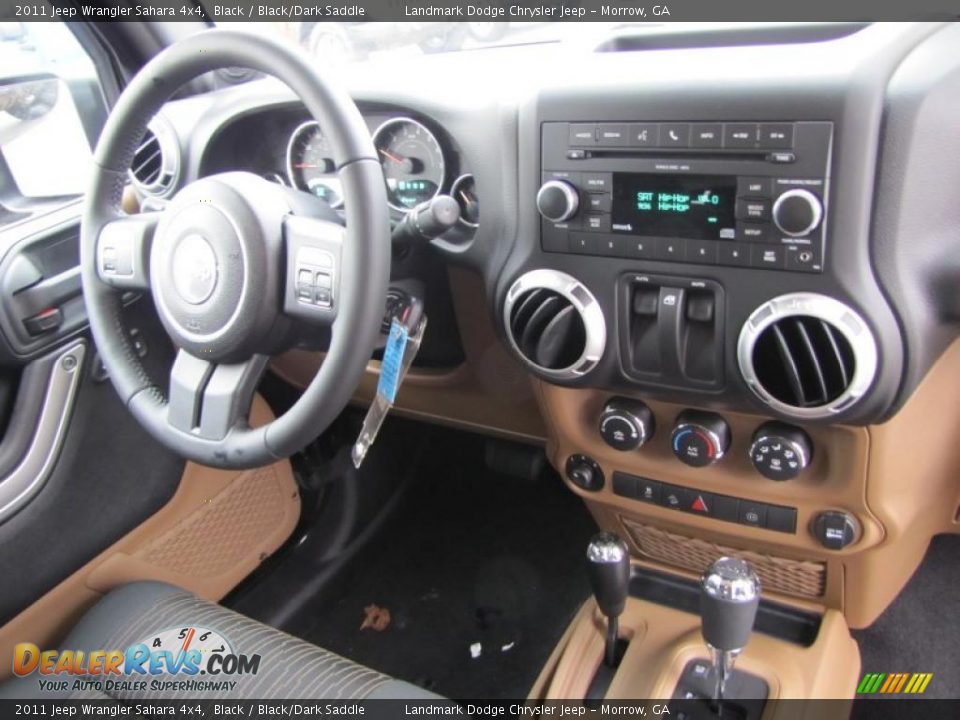 Dashboard of 2011 Jeep Wrangler Sahara 4x4 Photo #10