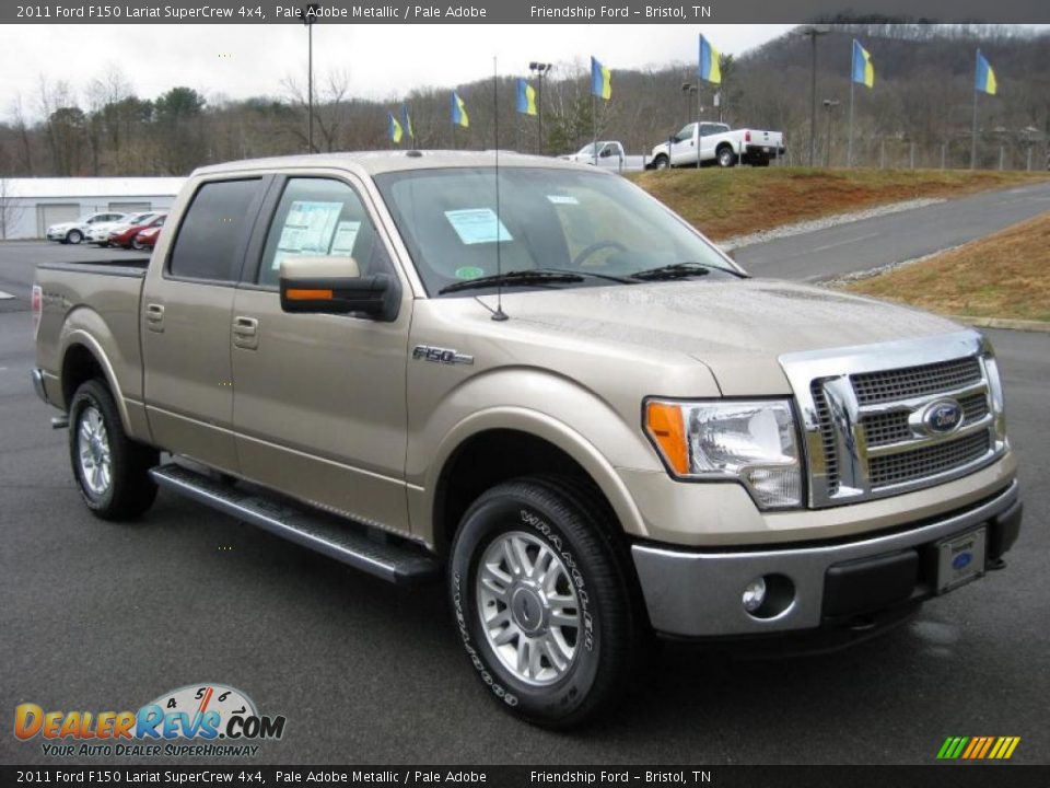 Front 3/4 View of 2011 Ford F150 Lariat SuperCrew 4x4 Photo #4