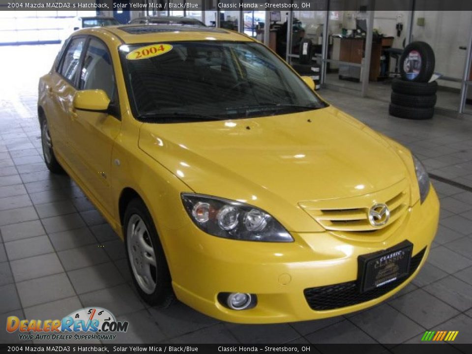 2004 Mazda MAZDA3 s Hatchback Solar Yellow Mica / Black/Blue Photo #1