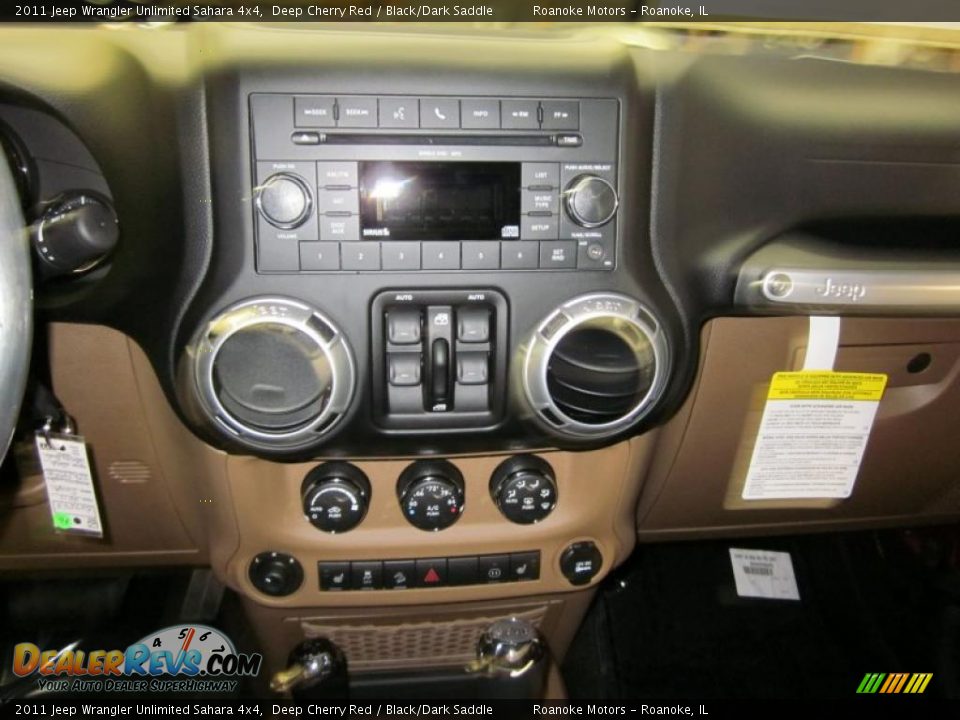 Dashboard of 2011 Jeep Wrangler Unlimited Sahara 4x4 Photo #9