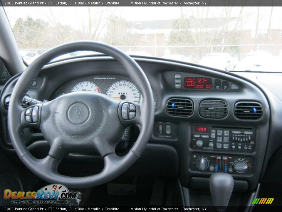 Dashboard of 2003 Pontiac Grand Prix GTP Sedan Photo #4