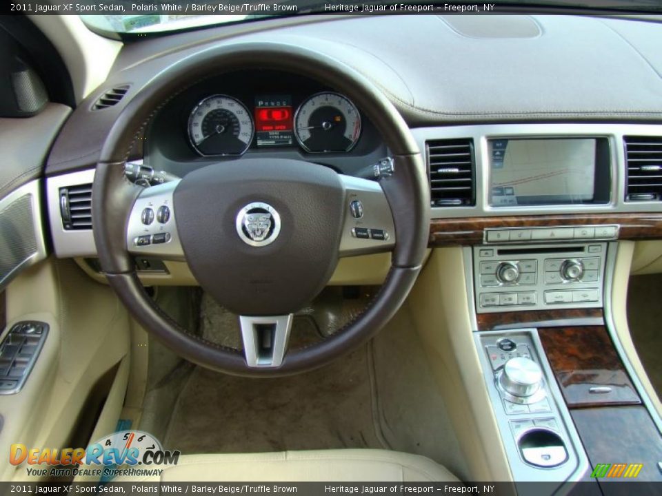 Dashboard of 2011 Jaguar XF Sport Sedan Photo #13