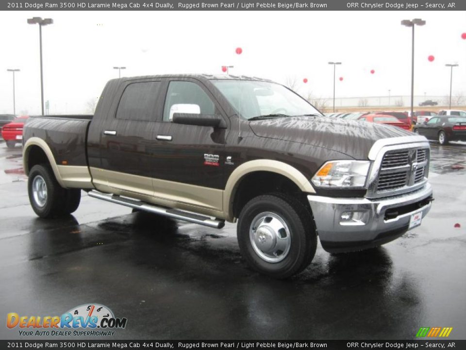 Front 3/4 View of 2011 Dodge Ram 3500 HD Laramie Mega Cab 4x4 Dually Photo #3