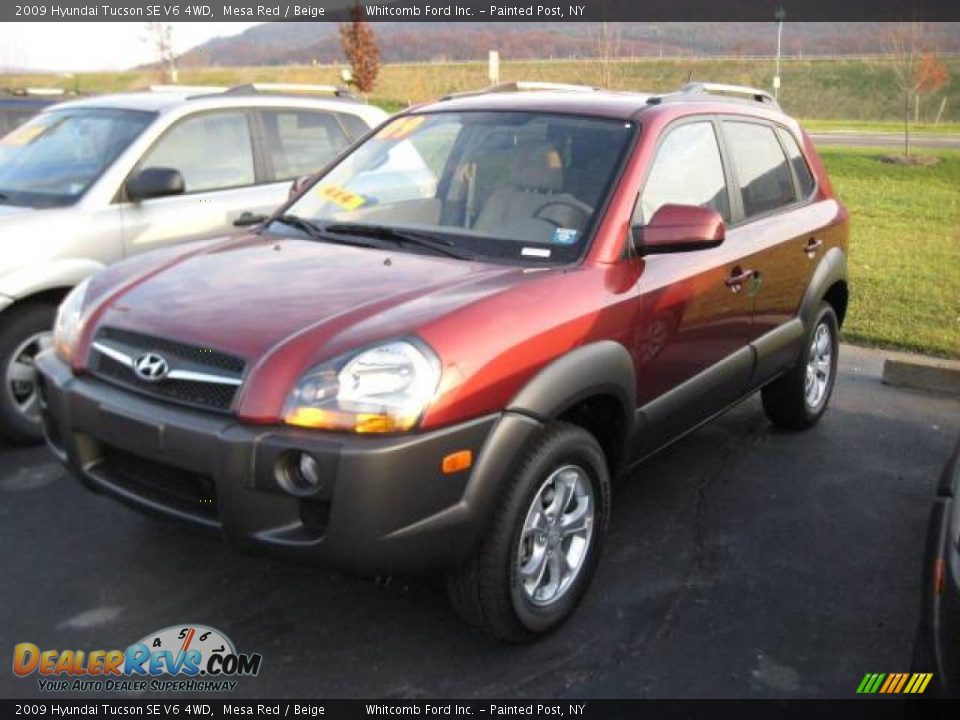 2009 Hyundai Tucson SE V6 4WD Mesa Red / Beige Photo #1