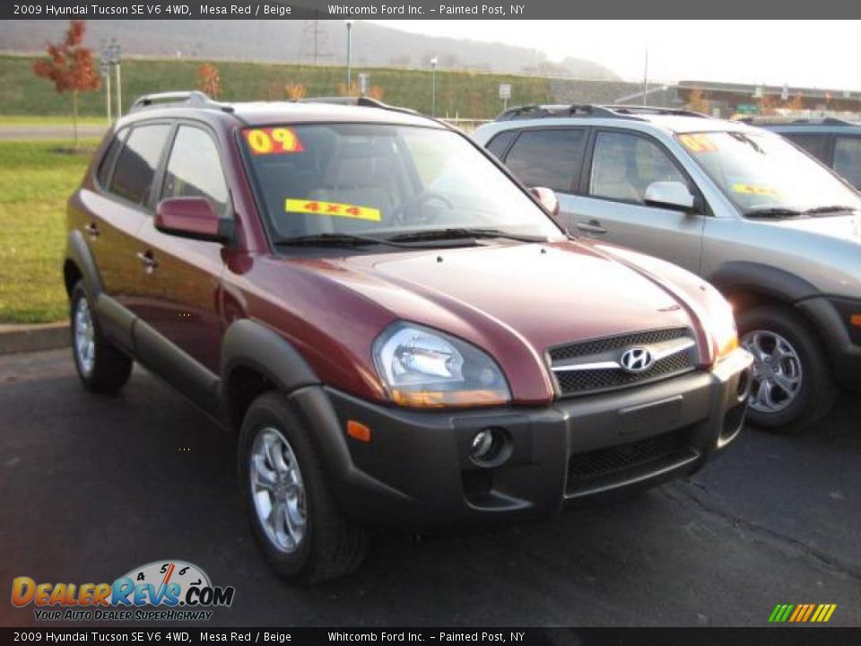 2009 Hyundai Tucson SE V6 4WD Mesa Red / Beige Photo #2