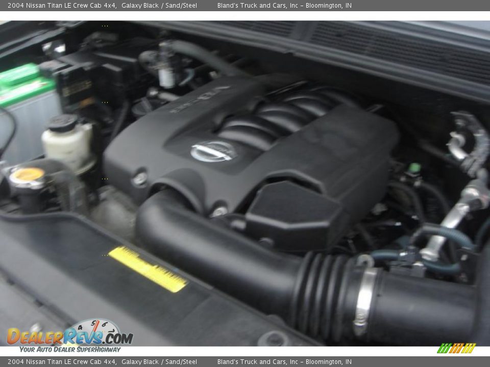 2004 Nissan Titan LE Crew Cab 4x4 Galaxy Black / Sand/Steel Photo #19