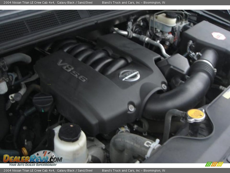 2004 Nissan Titan LE Crew Cab 4x4 Galaxy Black / Sand/Steel Photo #20