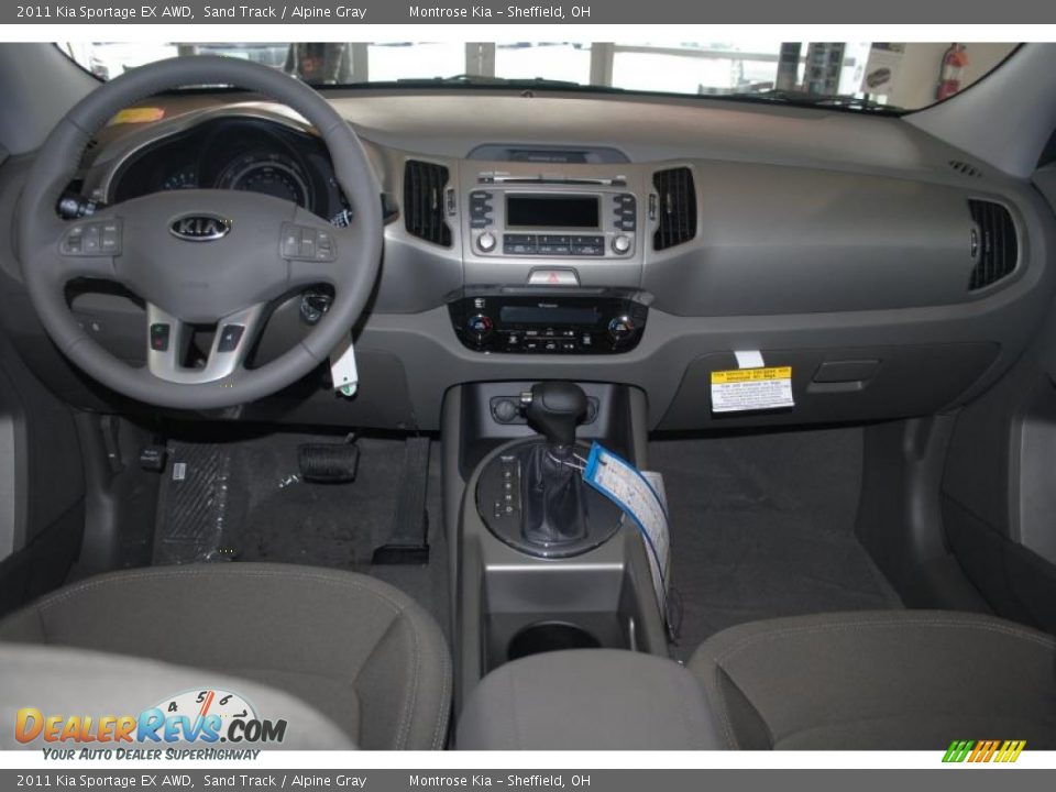 Dashboard of 2011 Kia Sportage EX AWD Photo #11