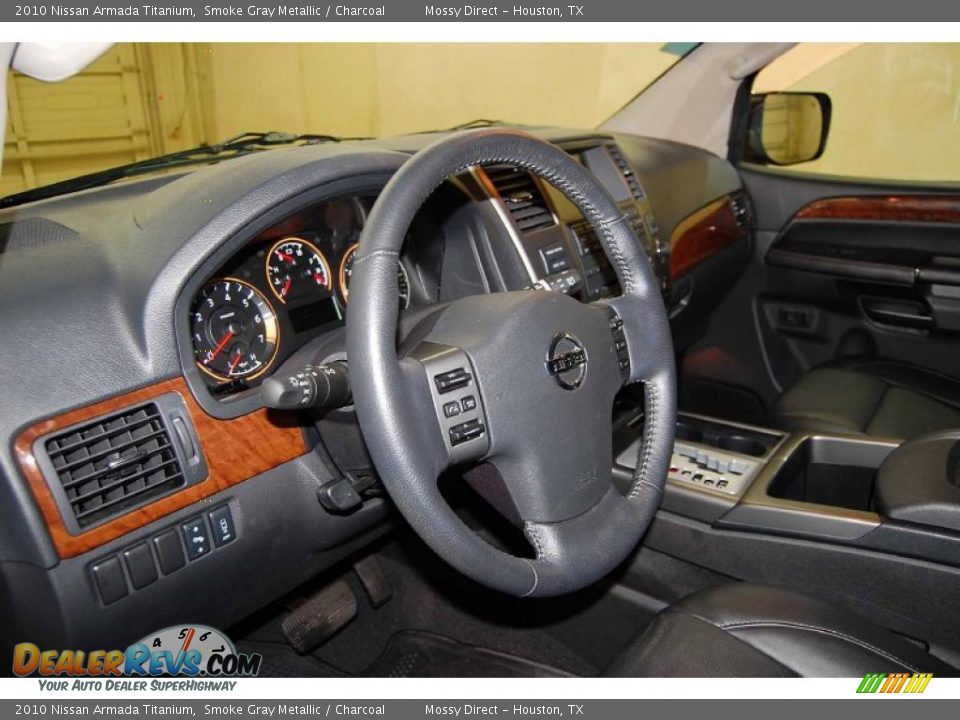 Dashboard of 2010 Nissan Armada Titanium Photo #11