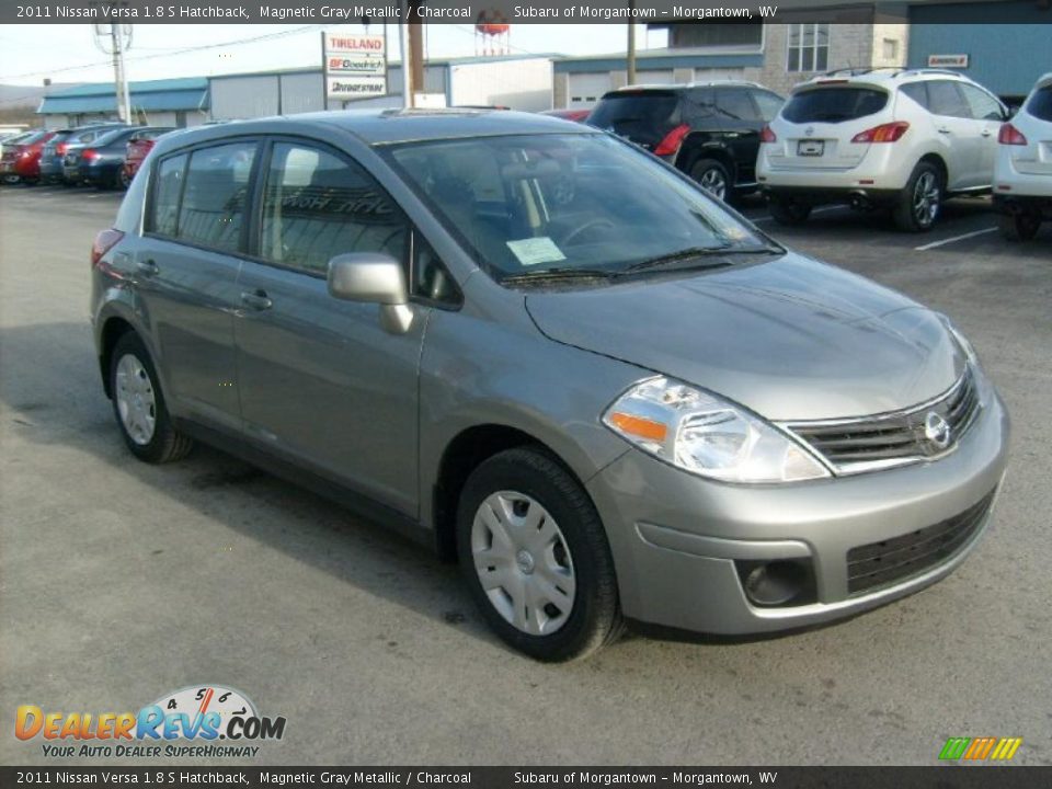 Front 3/4 View of 2011 Nissan Versa 1.8 S Hatchback Photo #10