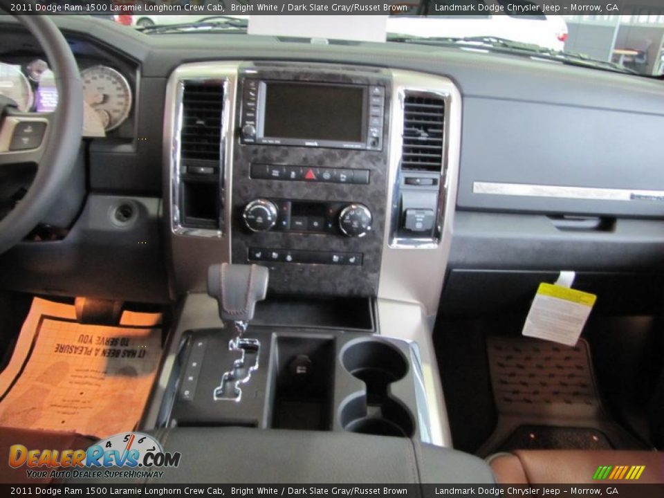 Dashboard of 2011 Dodge Ram 1500 Laramie Longhorn Crew Cab Photo #10