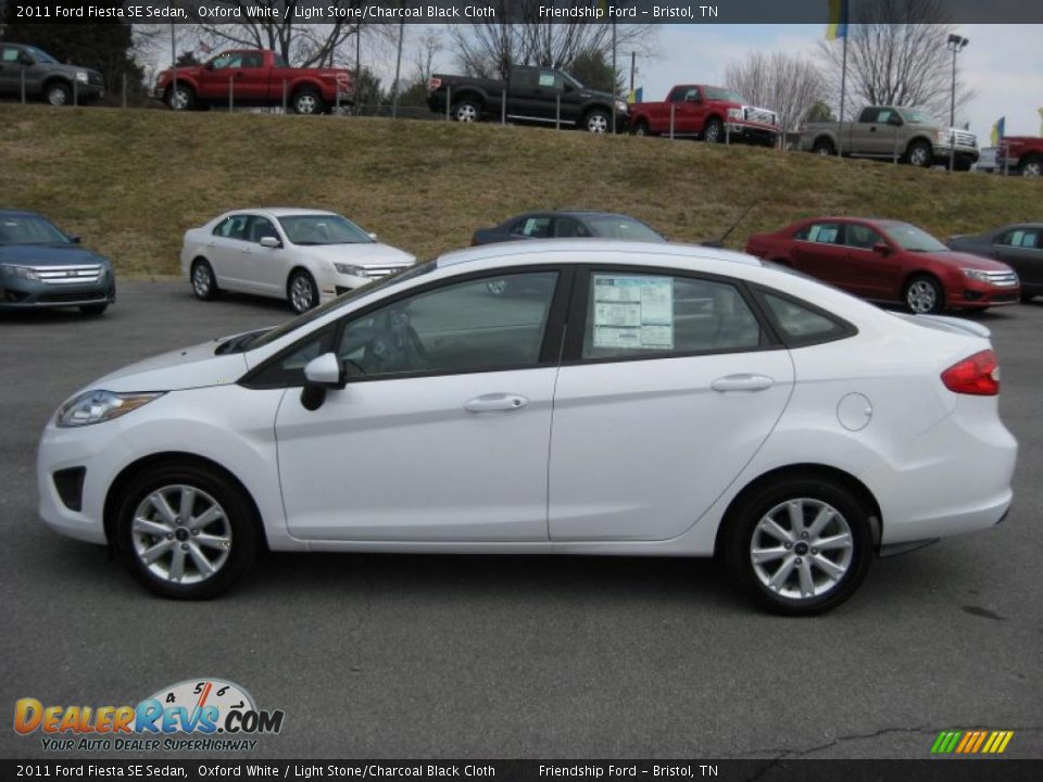 2011 Ford Fiesta SE Sedan Oxford White / Light Stone/Charcoal Black Cloth Photo #1