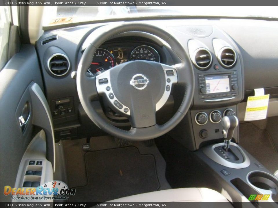 Dashboard of 2011 Nissan Rogue SV AWD Photo #17