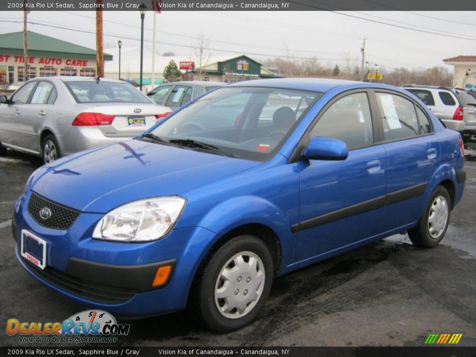 Front 3/4 View of 2009 Kia Rio LX Sedan Photo #1