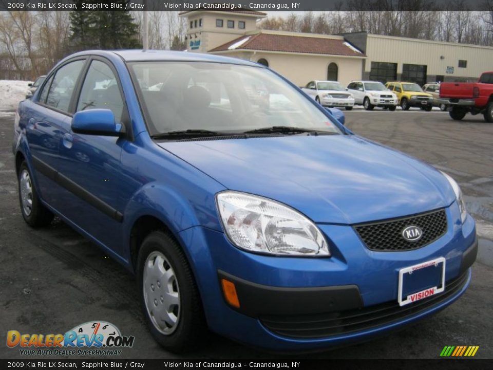 Front 3/4 View of 2009 Kia Rio LX Sedan Photo #15