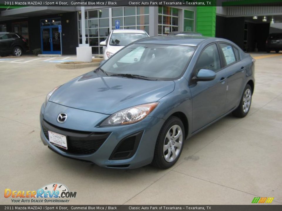 Front 3/4 View of 2011 Mazda MAZDA3 i Sport 4 Door Photo #1