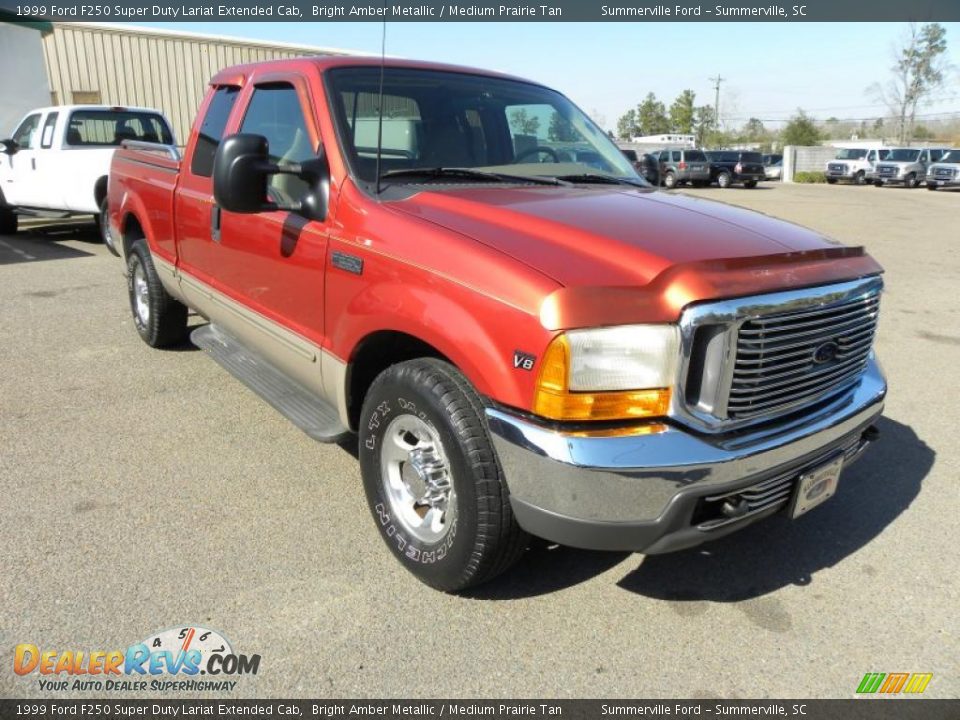 Front 3/4 View of 1999 Ford F250 Super Duty Lariat Extended Cab Photo #1