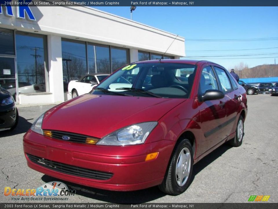 Front 3/4 View of 2003 Ford Focus LX Sedan Photo #1