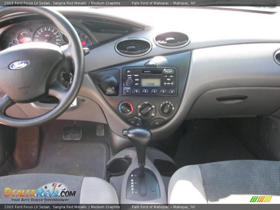 2003 Ford Focus LX Sedan Sangria Red Metallic / Medium Graphite Photo #15