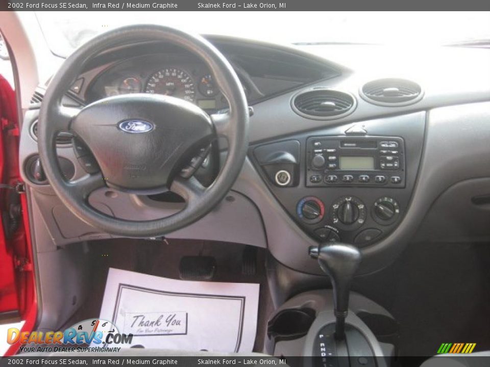 Dashboard of 2002 Ford Focus SE Sedan Photo #4