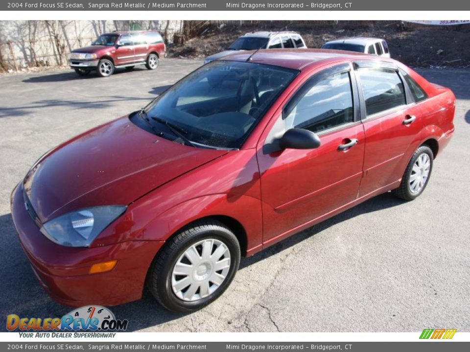 2004 Ford Focus SE Sedan Sangria Red Metallic / Medium Parchment Photo #1