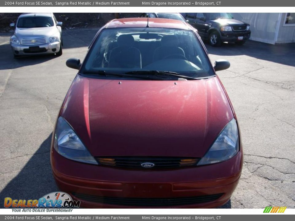 2004 Ford Focus SE Sedan Sangria Red Metallic / Medium Parchment Photo #2